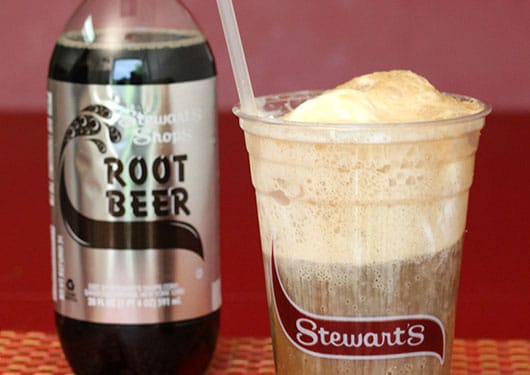 Rootbeer bottle next to a rootbeer float
