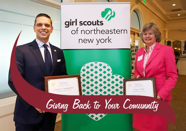 Susan Dake receiving honorary gold award from girl scouts