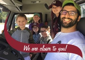 Stewart's Truck Driver with his family and the text we are closer to you