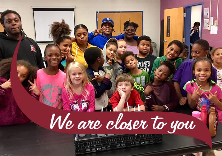 Troy Stewart's Shop donates ice cream to Homework Club in Troy