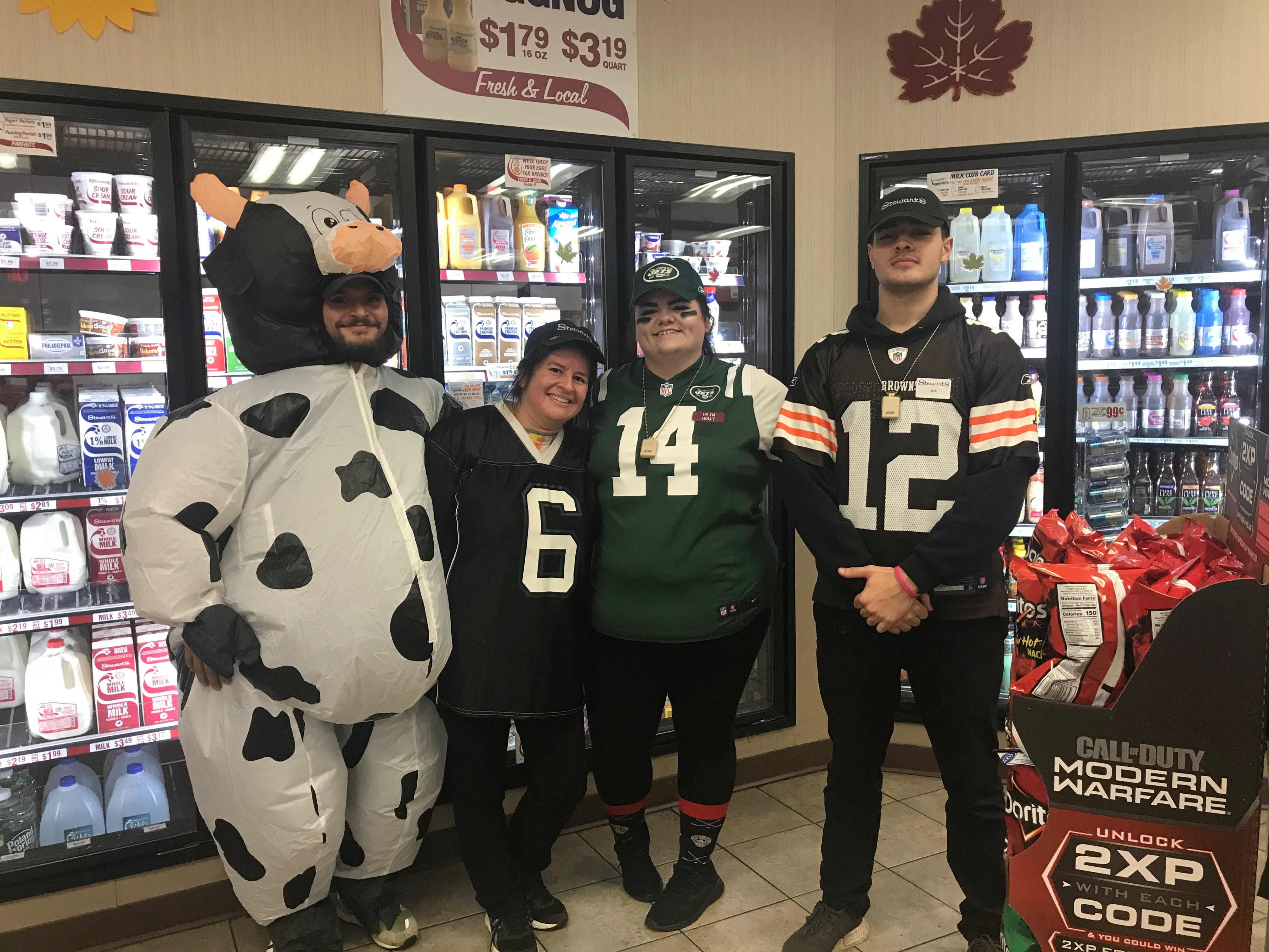 football team and cow on Halloween
