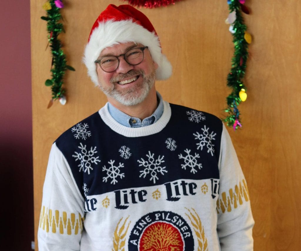 Gary Dake wearing Miller/Coors ugly sweater