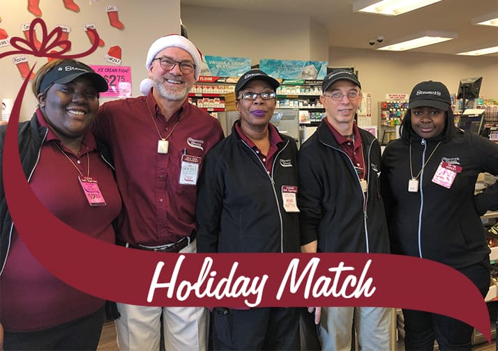 Holiday Match Group shot of Partners with Stewarts president Gary Dake