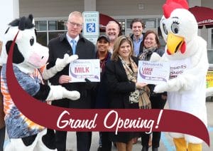 Flavor and Fresh present milk and egg certificates.