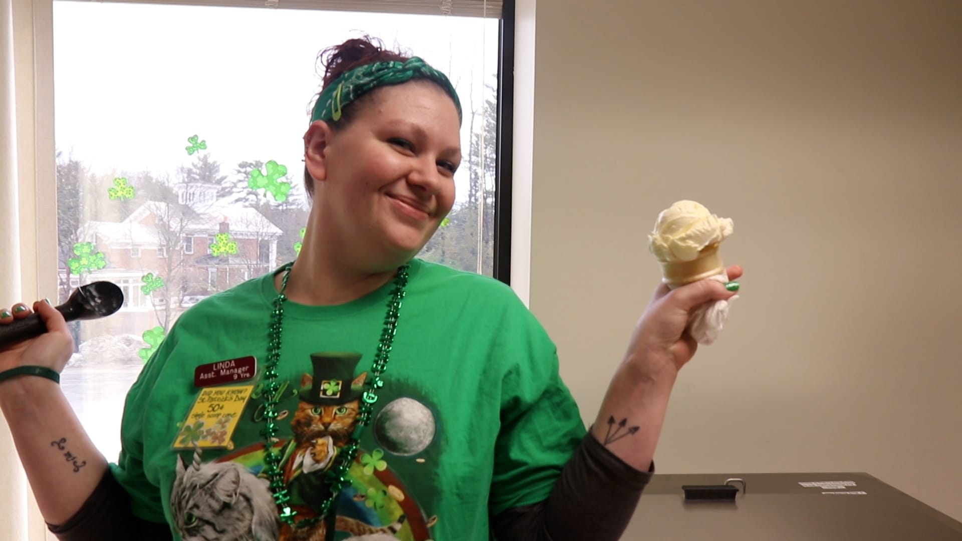 Linda the partner holding a vanilla ice cream cone