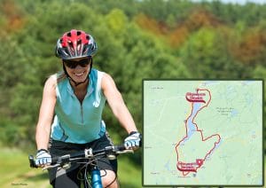 A woman on a bike. A map with a bike route showing two stewarts shops