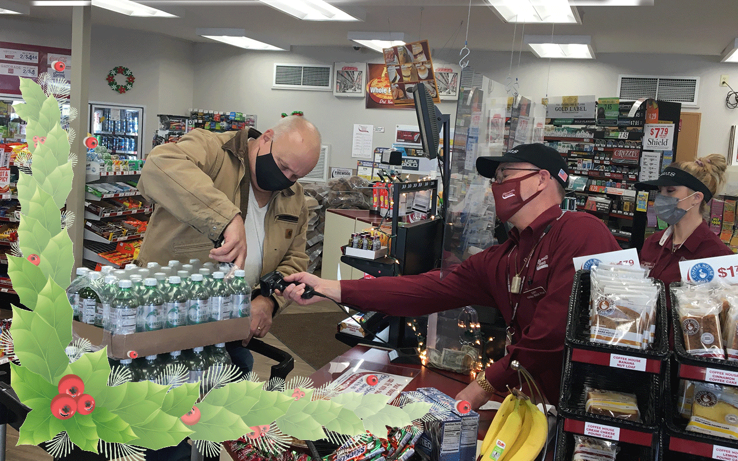 a customer buying a case of soda. The president of stewarts shops, Gary Dake, using the register to check him out.