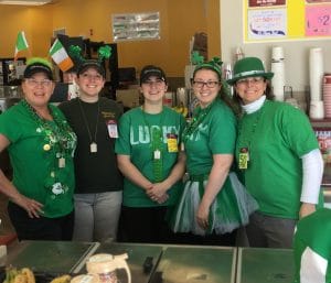Kathleen and other shop Partners working on St. Patrick's Day