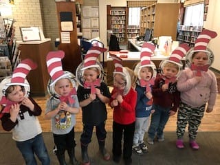 Children dressed up as the Cat in the Hat at Valley Falls free library
