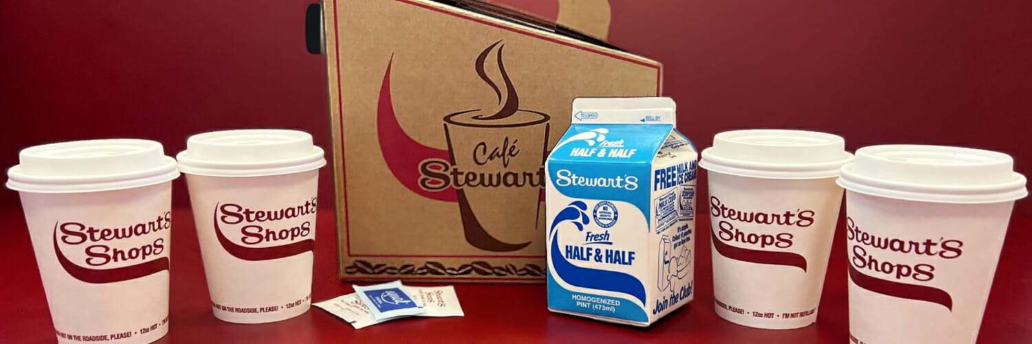 Box of Coffee featuring stewart's cups, sweeteners, and half & half