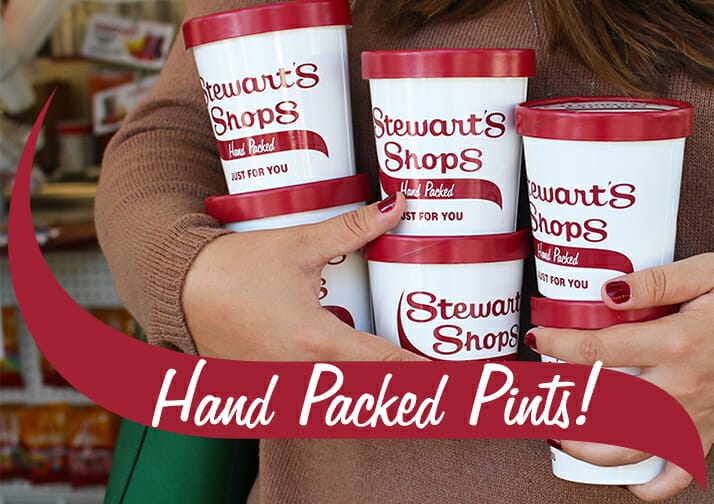 Person Holding 6 hand packed pints