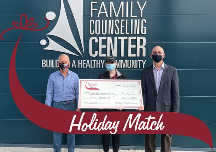 Family Counseling Center representatives with their Holiday Match Check