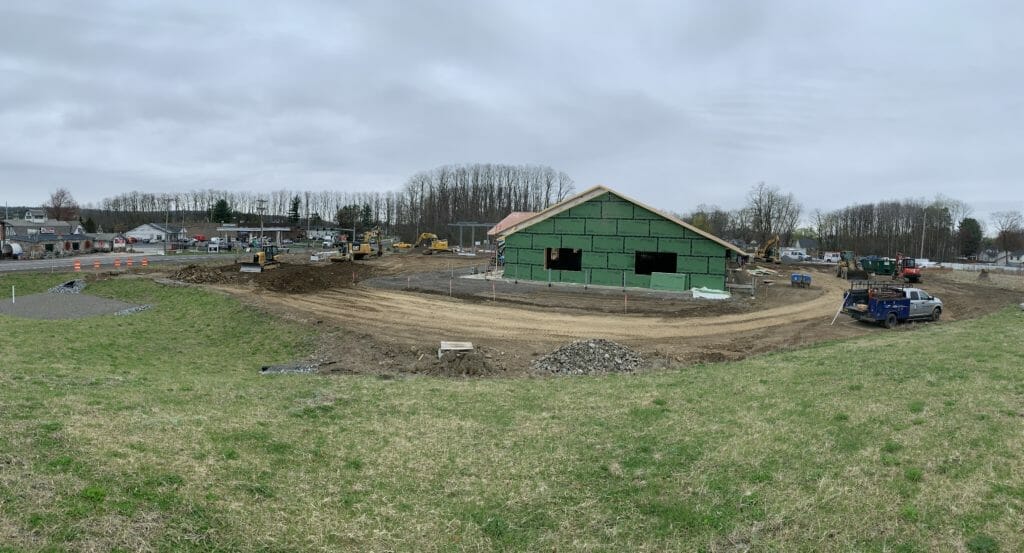 Side view of shop being built