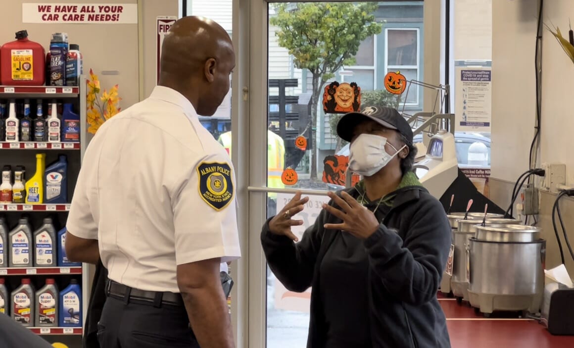 Cop Speaking with Civilian