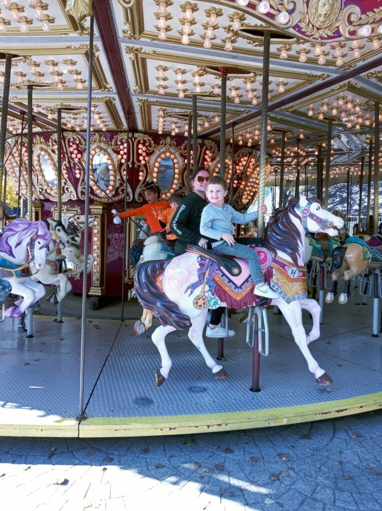 Kids riding Carousel