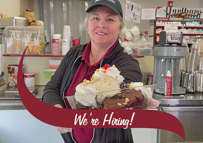 Stewart's Partner Sue holding a brownie sundae