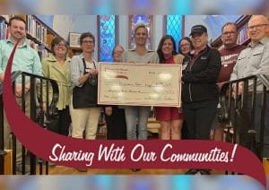 Stillwater Library receives check from Stewarts Shops