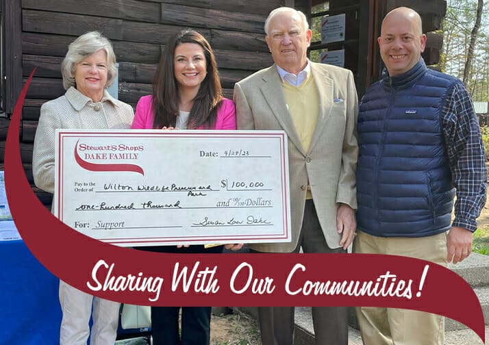 Susan Dake, Bill Dake, Jennifer Frame, and Chuck Marshall holding a big Stewart's Check.