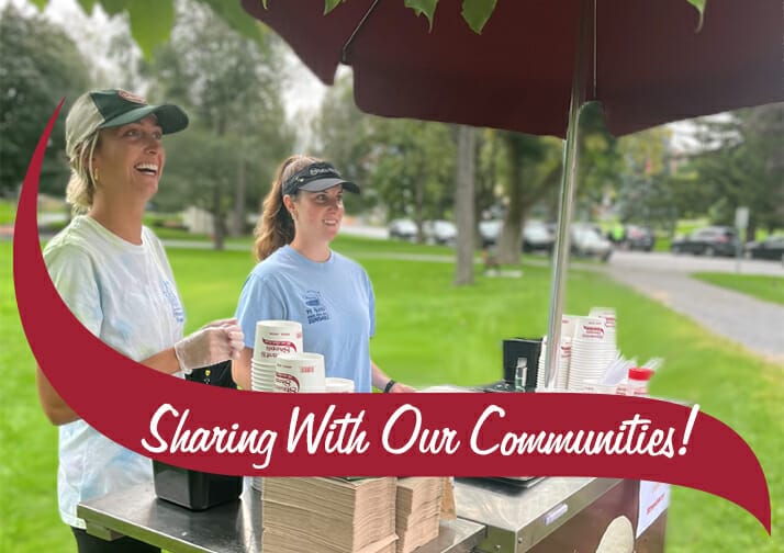 2 Stewart's Partners scooping ice cream at event