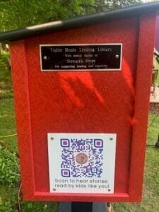 Yaddo Reads Lending Library book holder and QR code