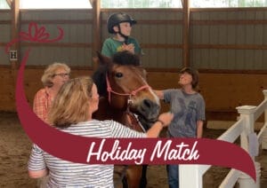 Young boy riding a horse, equine therapy, at Victoria Acres facility.