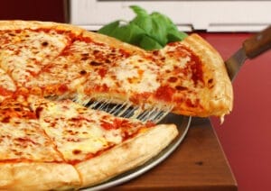 Stewart’s has got you covered for The Big Game this Sunday with all the football game snacks! We're your one stop shop! Seen in this image, grab a slice of cheese pizza!