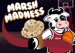 Flavor the Cow holding a basketball and a cone of Marsh Madness