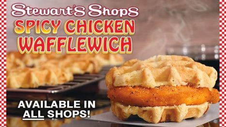 caption reads, "Stewart's Shops Spicy Chicken Wafflewich. Available in all Shops. banners of red and white checkers. spicy chicken wafflewich featured on bottom right hand corner.