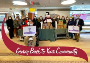 Group of Partners celebrating Leap Year with a kindness day.