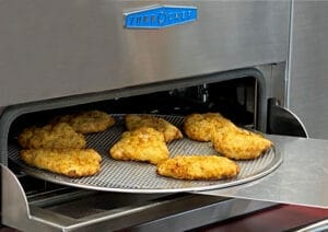 Chicken pieces coming out of an oven. Stewart's Shops using World Food Safety Day to highlight our strict food safety standards. 