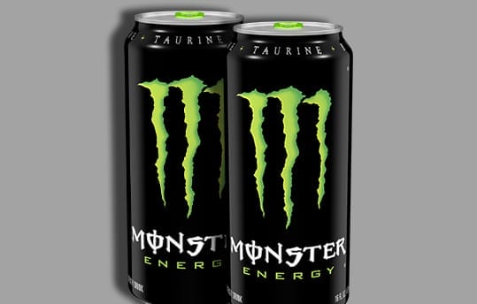 Two Monster energy drinks.