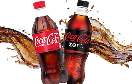 A bottle of regular Coca Cola on left and Coke zero on the right.