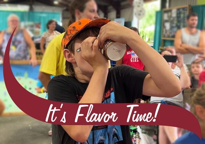 Kid eating a pint of Stewart's ice cream.