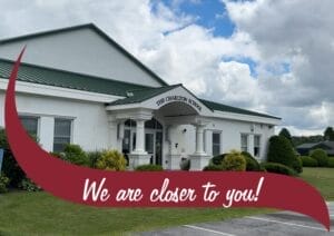 The Charlton School with a graphic wave in front that reads "We are closer to you!".