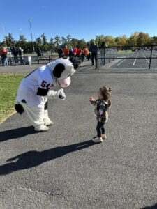 Flavor the cow with young child 