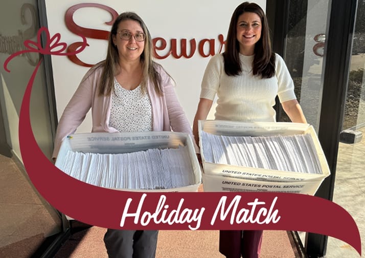 Stewart's Shops employees prepare to mail 1,765 checks to nonprofit organizations in connection with our Holiday Match program.