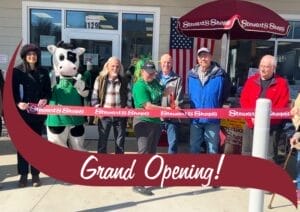 Customers cutting ribbon at Grand Opening