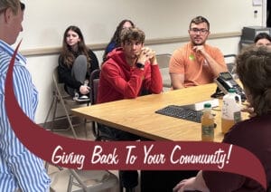 Stewart's Shops hosts Junior Achievement job shadow for students. Students at table. Giving back to your community.