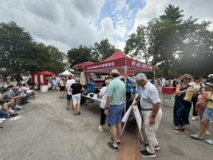 Customers in line to get free Stewart's ice cream at the Saratoga race course