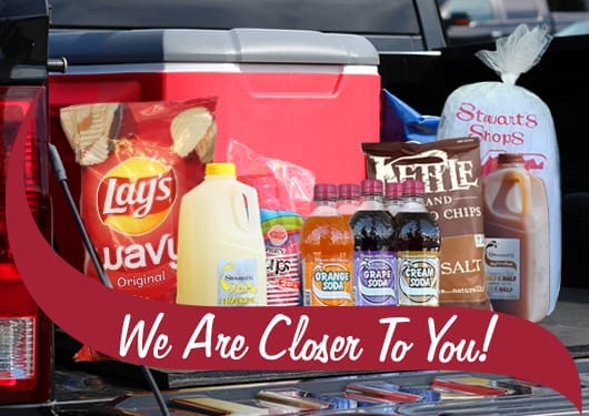 Truck bed filled with Stewart's chips, lemonade soda and ice for holiday weekend