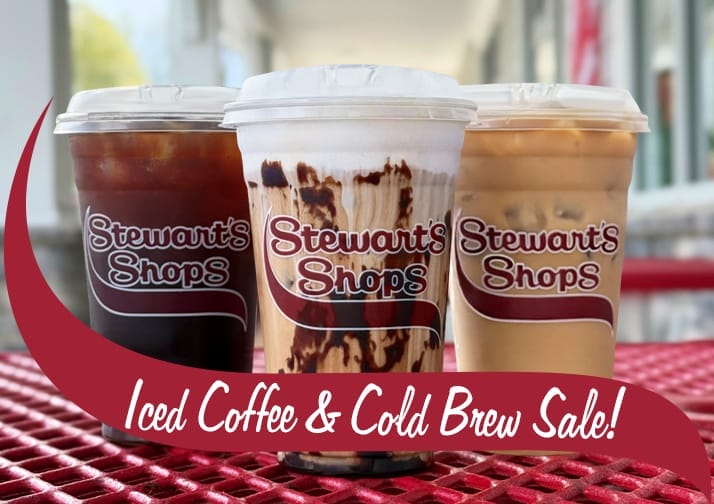 Three Stewart's iced coffees and cold brews on a red table. Iced coffee and cold brew sale.
